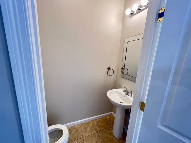 a bathroom with a sink and toilet