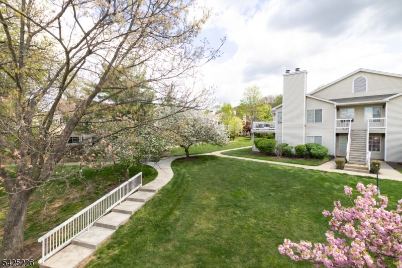 90 Mayfield Road, Unit 90 Bedminster, NJ 07921 - Photo 2 of 38 a view of a house with backyard and garden