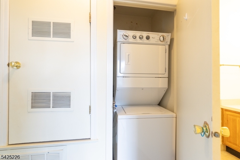 90 Mayfield Road, Unit 90 Bedminster, NJ 07921 - Photo 23 of 38 a utility room with dryer and washer