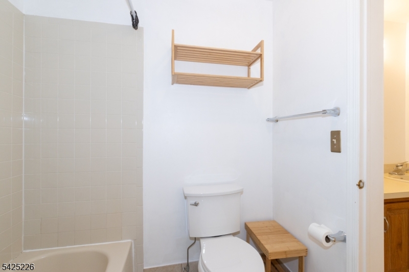 90 Mayfield Road, Unit 90 Bedminster, NJ 07921 - Photo 26 of 38 a bathroom with a toilet and a sink