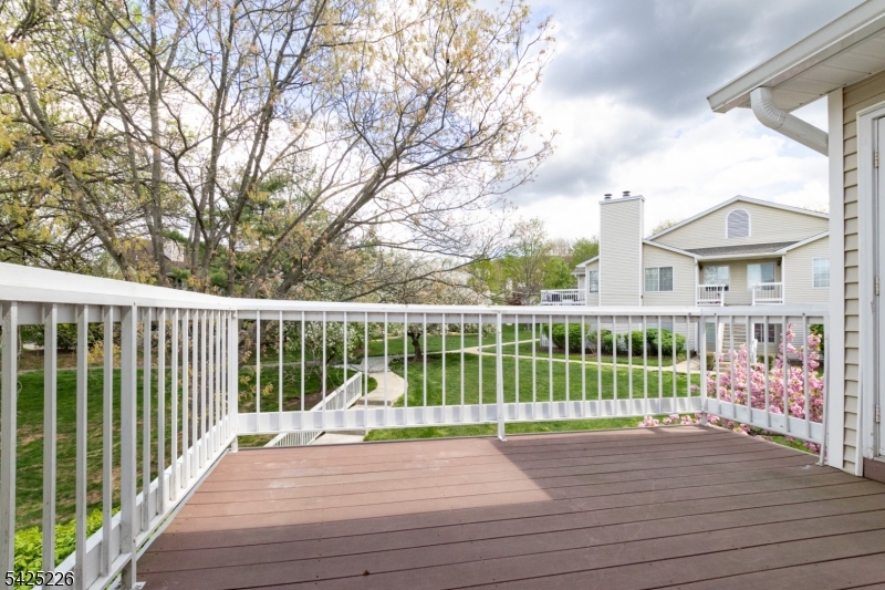 90 Mayfield Road, Unit 90 Bedminster, NJ 07921 - Photo 29 of 38 a view of a deck with a large trees