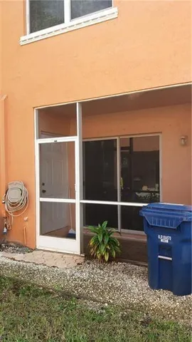 a front view of a house with backyard