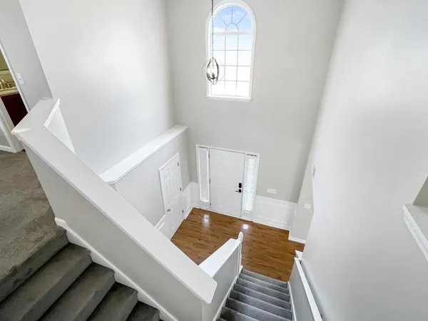 a view of entryway with wooden floor