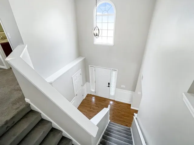 a view of entryway with wooden floor