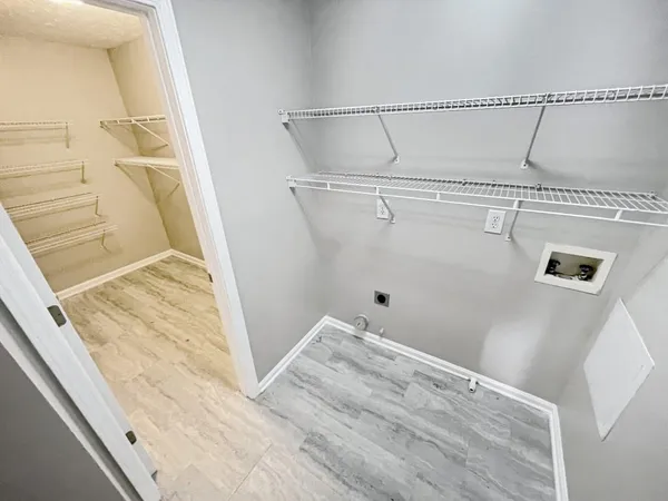 a view of a room with racks on the wall