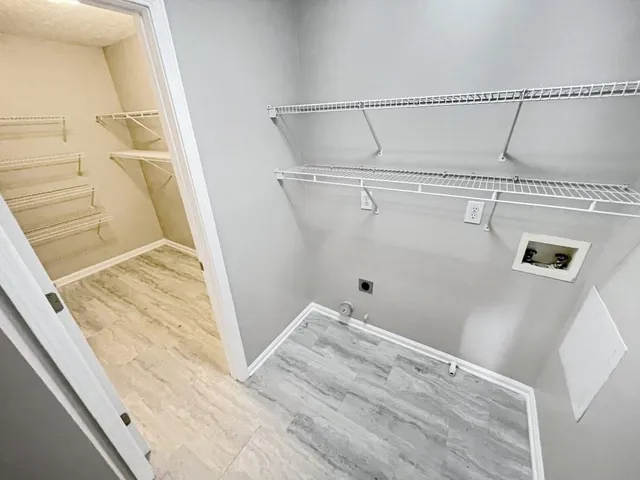 a view of a room with racks on the wall