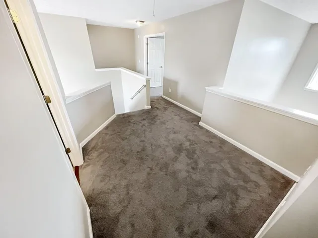 a view of kitchen and wooden floor