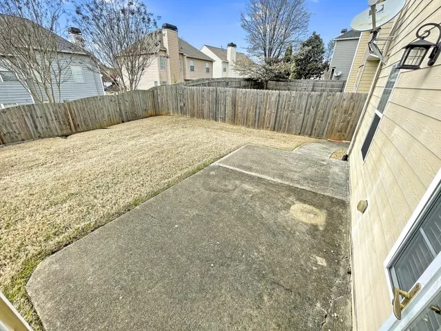 a view of a house with a patio