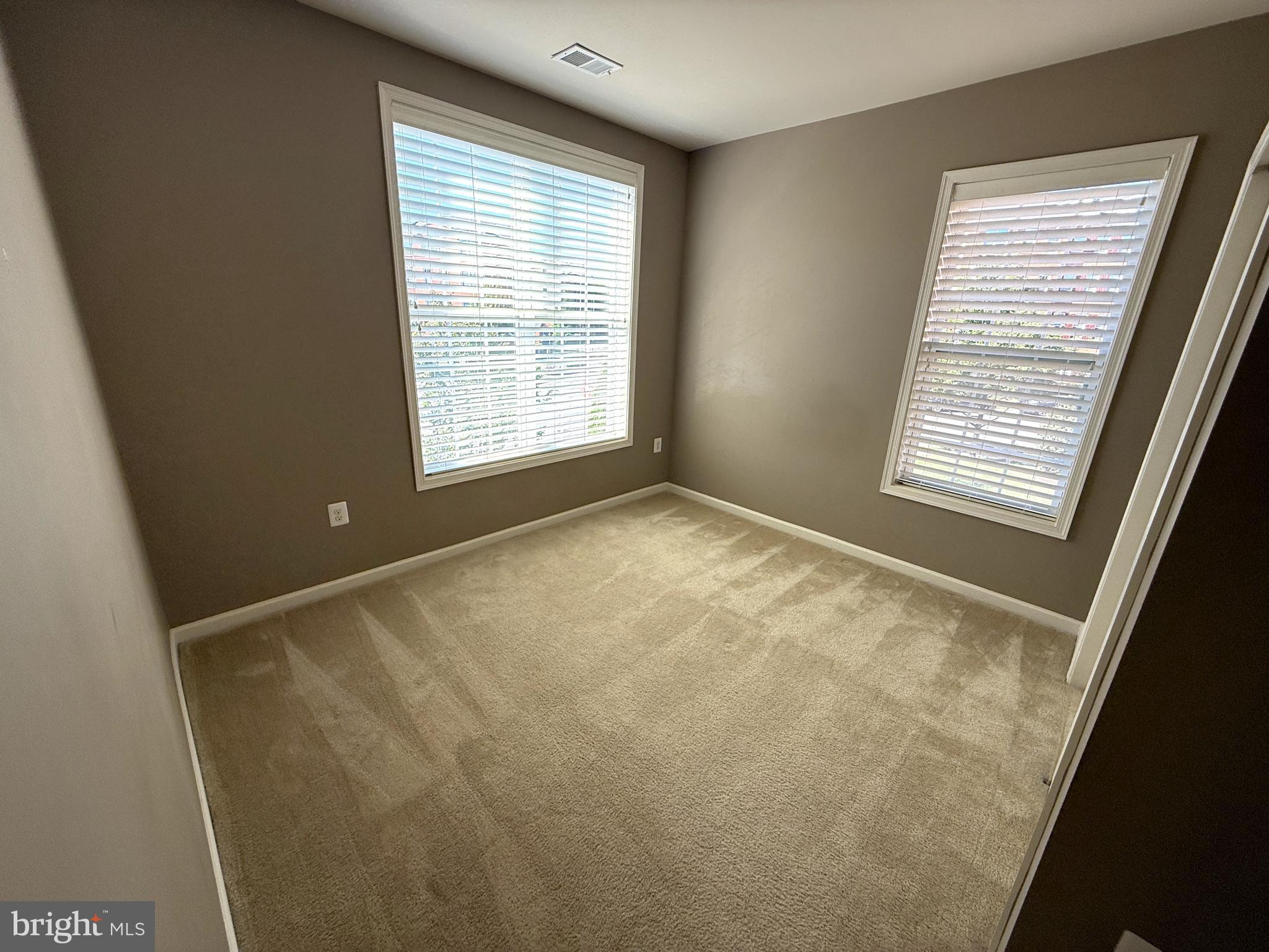43132 Thoroughfare Gap Terrace Ashburn, VA 20148 - Photo 14 of 18 a view of an empty room with a window