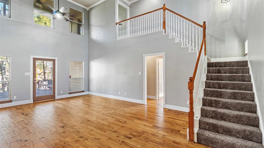 431 Genoa Court Princeton, TX 75407 - Photo 15 of 39 a view of an entryway with wooden floor and door