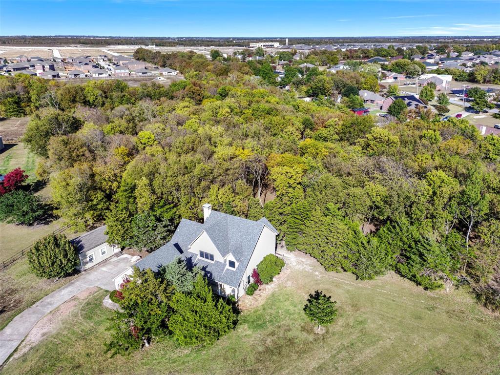 431 Genoa Court Princeton, TX 75407 - Photo 8 of 39 an aerial view of a house with a yard