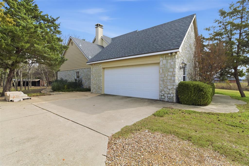 431 Genoa Court Princeton, TX 75407 - Photo 9 of 39 a view of a house with a yard