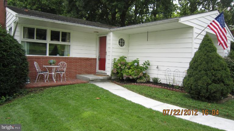 6736 Glenkirk Road Baltimore, MD 21239 - Photo 27 of 30 Relax w/ a Cup of Coffee on your Front Porch