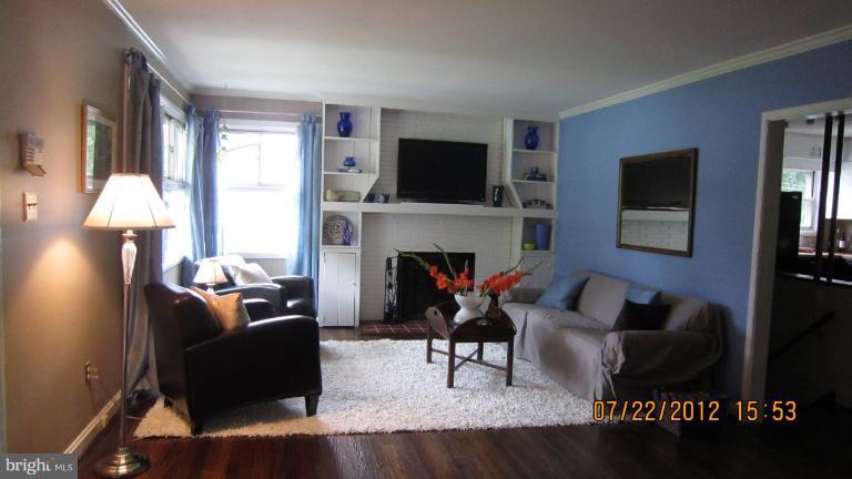 6736 Glenkirk Road Baltimore, MD 21239 - Photo 29 of 30 Cozy Fireplace in Living Room