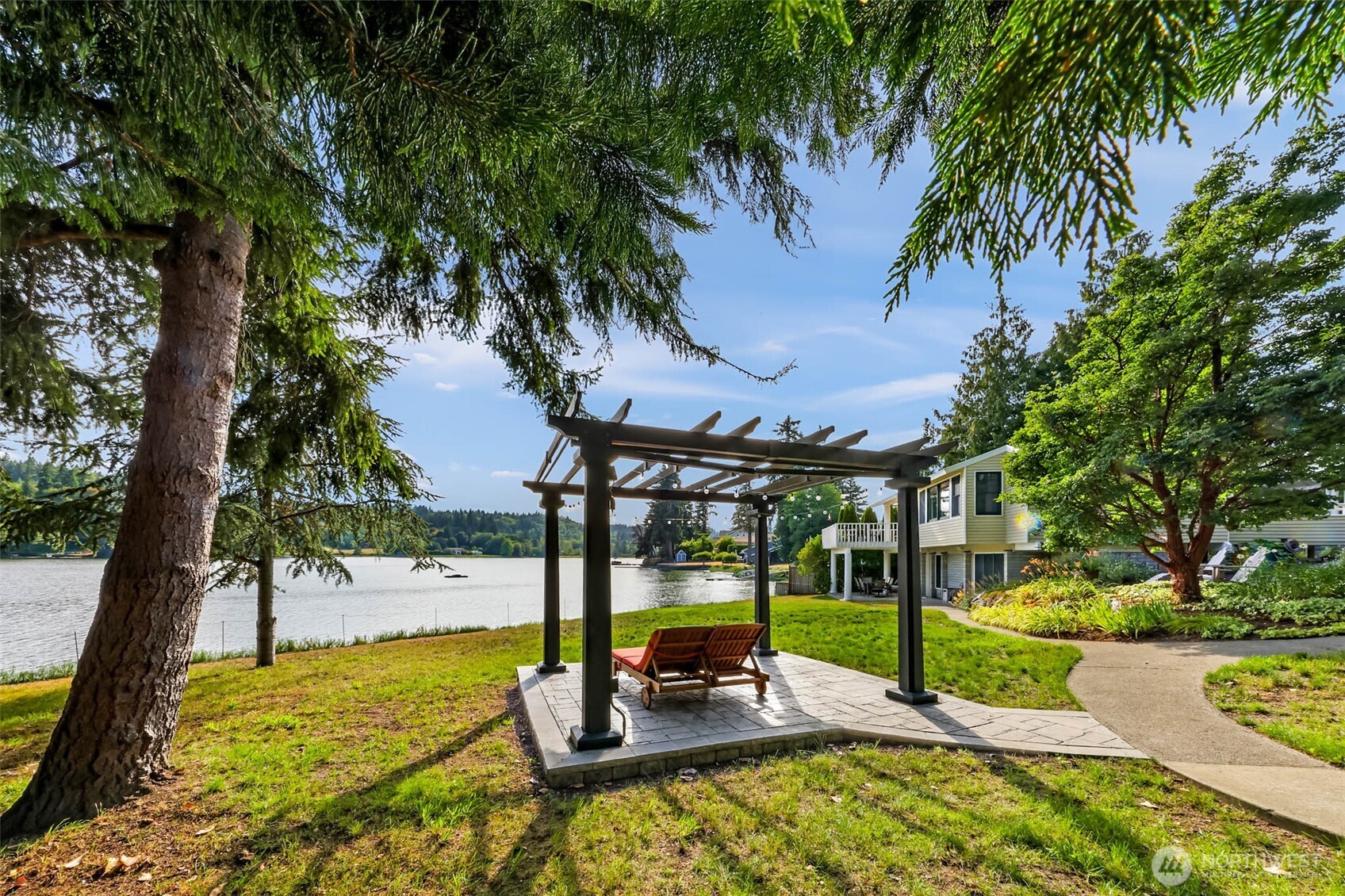 a view of a swimming pool with a patio