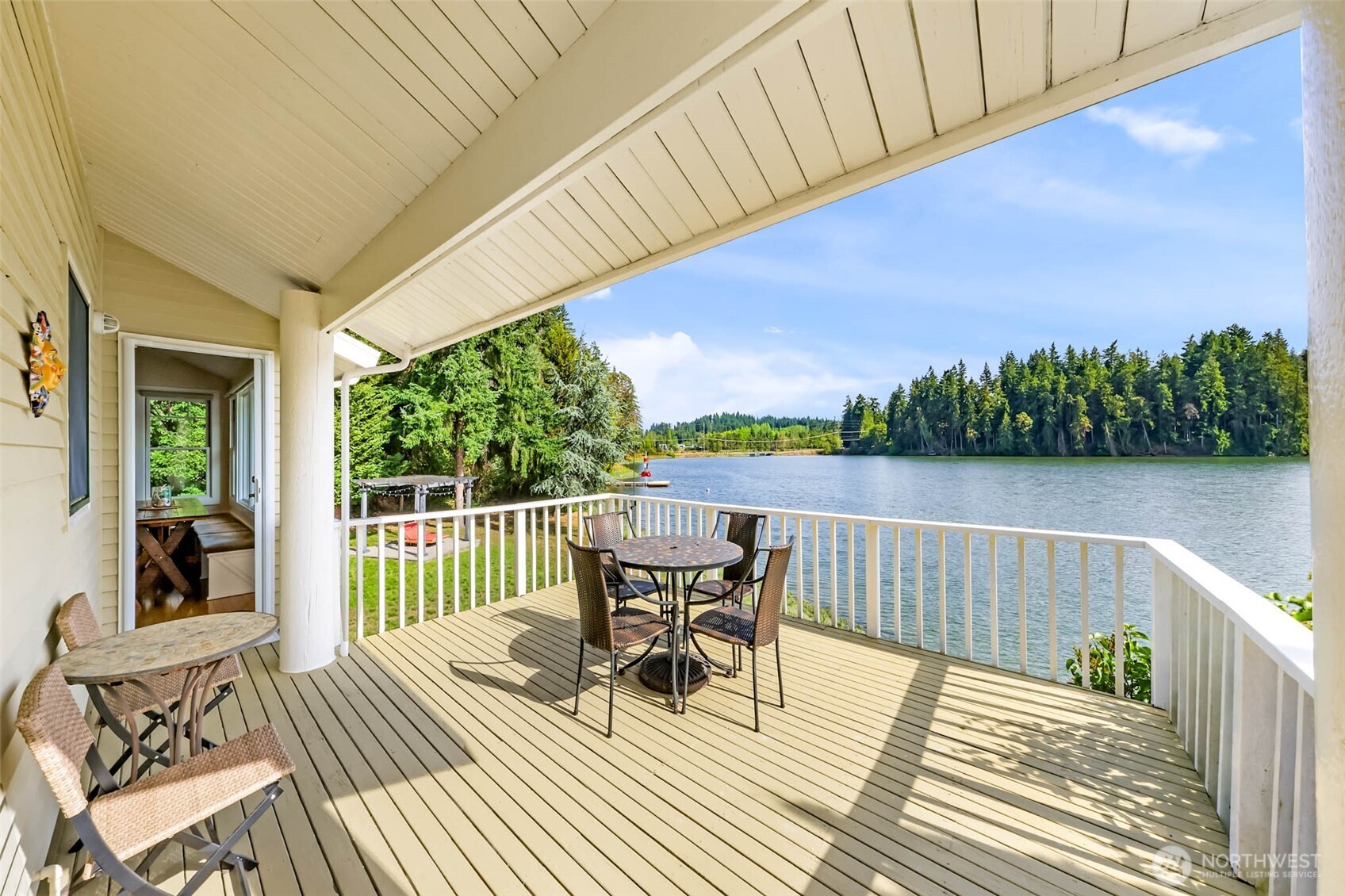 15485 Northeast Peterson Road Keyport, WA 98345 - Photo 12 of 39 a view of a patio with two chairs and a table
