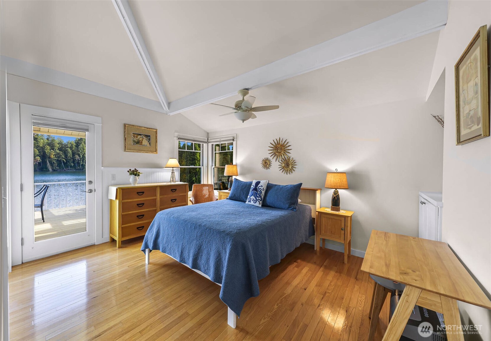 15485 Northeast Peterson Road Keyport, WA 98345 - Photo 14 of 39 a bedroom with a bed and wooden floor