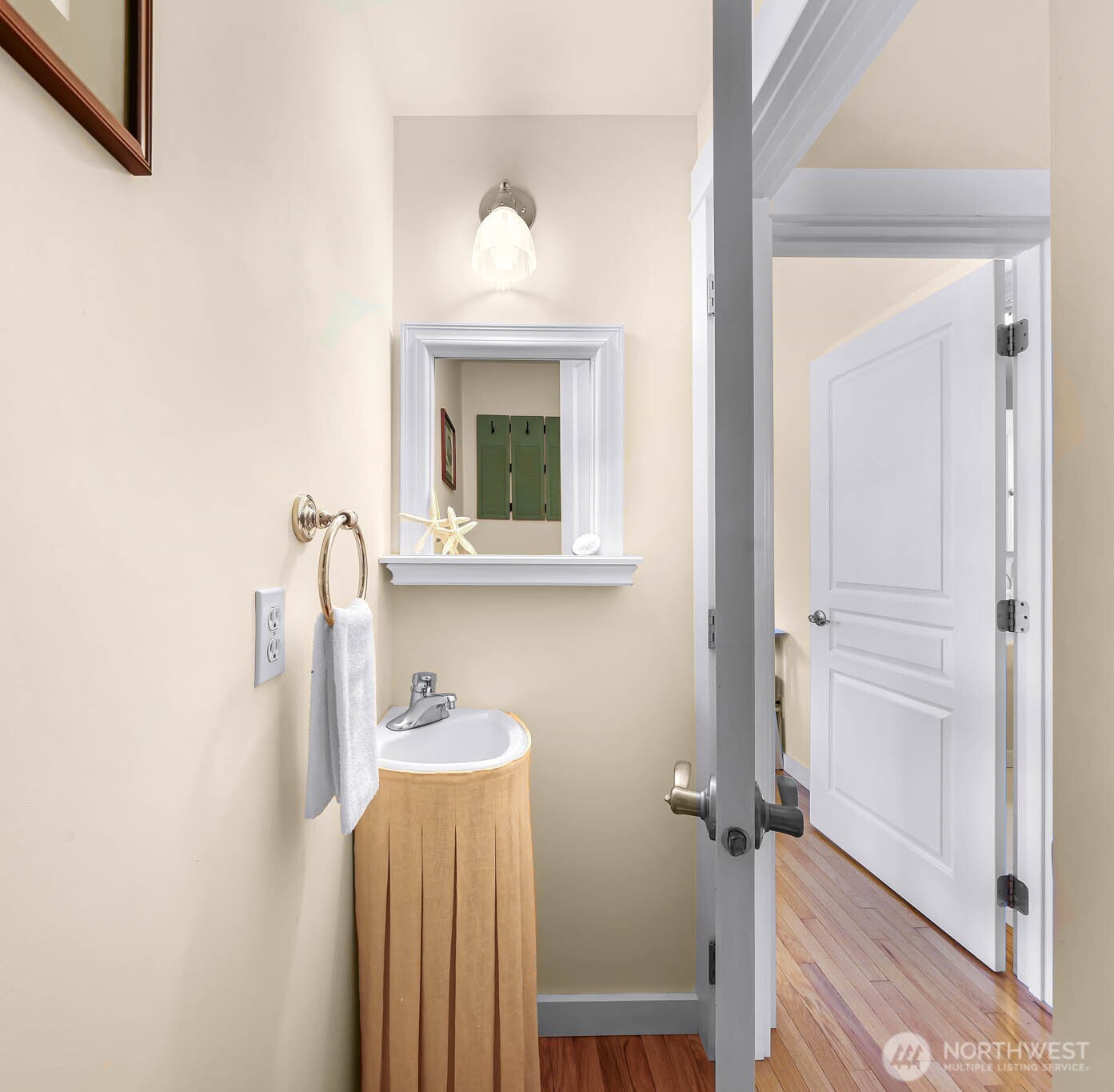 15485 Northeast Peterson Road Keyport, WA 98345 - Photo 19 of 39 a bathroom with a sink a mirror and shower