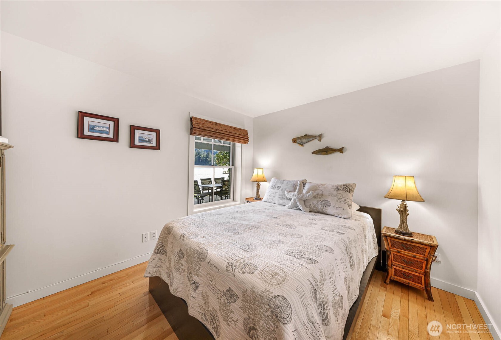 15485 Northeast Peterson Road Keyport, WA 98345 - Photo 20 of 39 a bedroom with a bed and a night stand