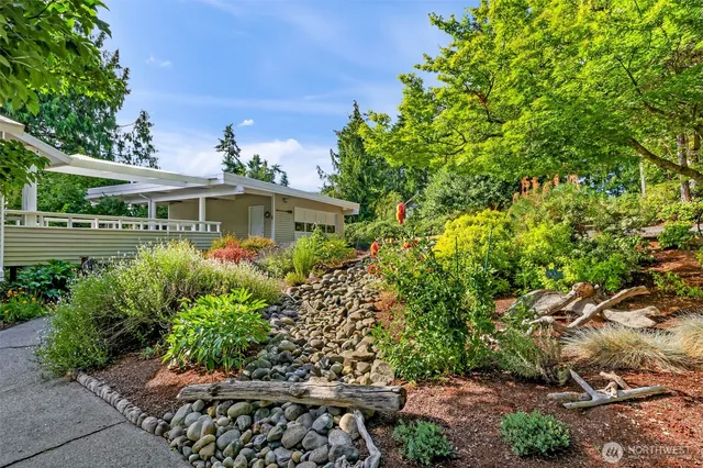 a view of a garden with a patio