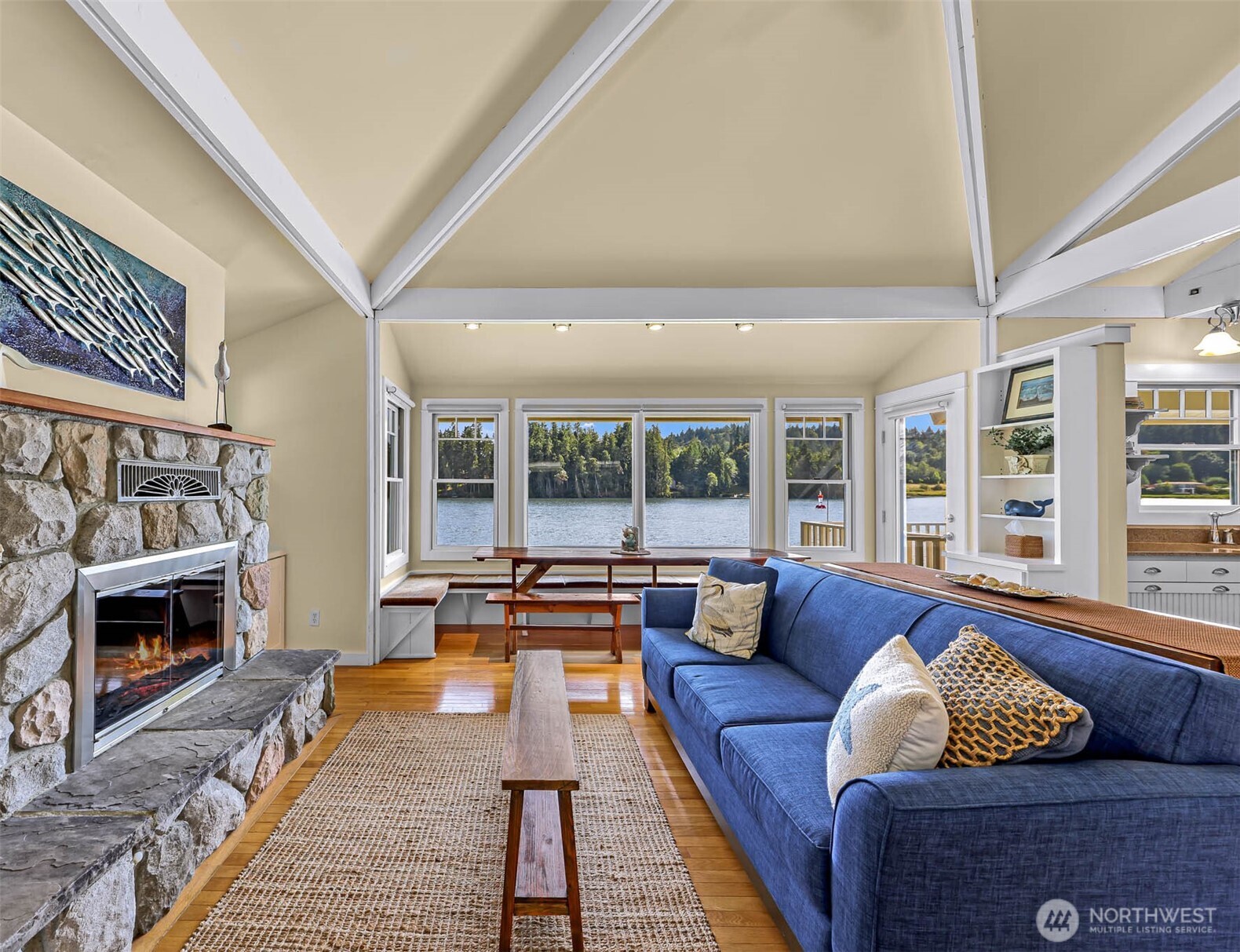 15485 Northeast Peterson Road Keyport, WA 98345 - Photo 5 of 39 a living room with furniture fireplace and a large window
