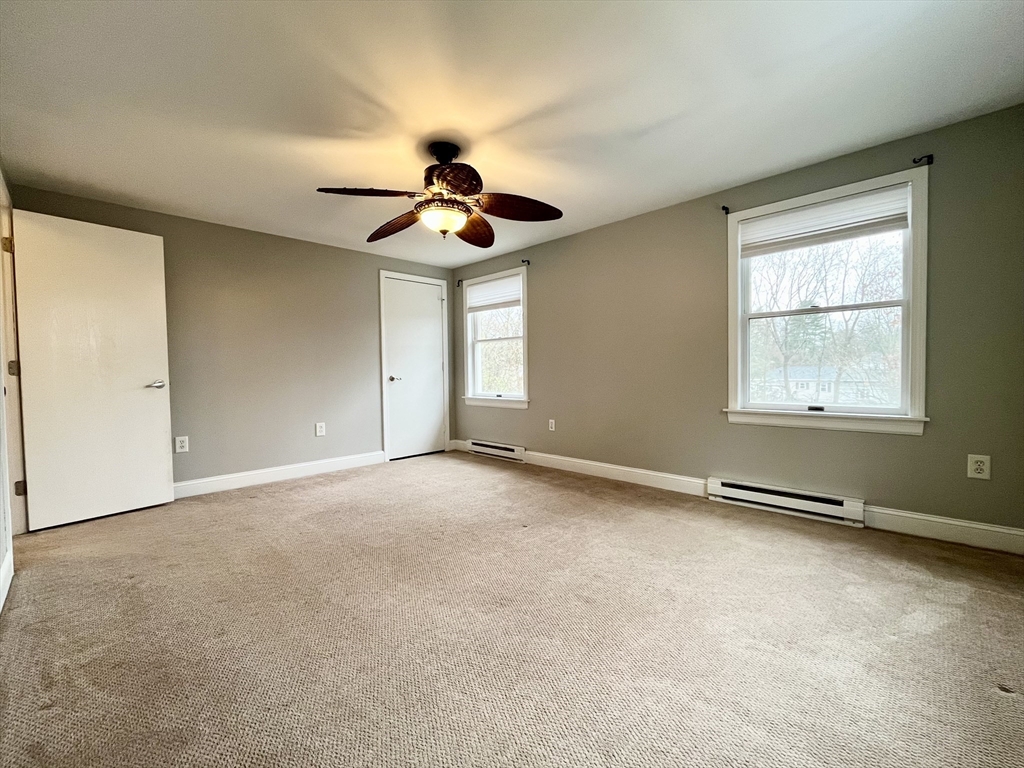 11 Jones Landing, Unit B Walpole, MA 02081 - Photo 11 of 18 a view of an empty room with a window