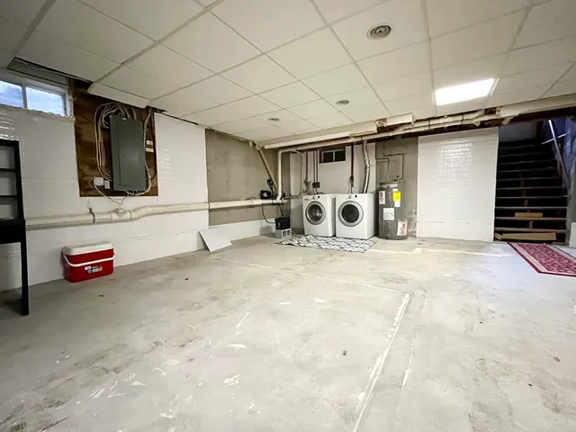 a garage with a car and furniture