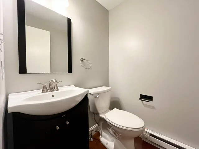 a bathroom with a sink and a toilet
