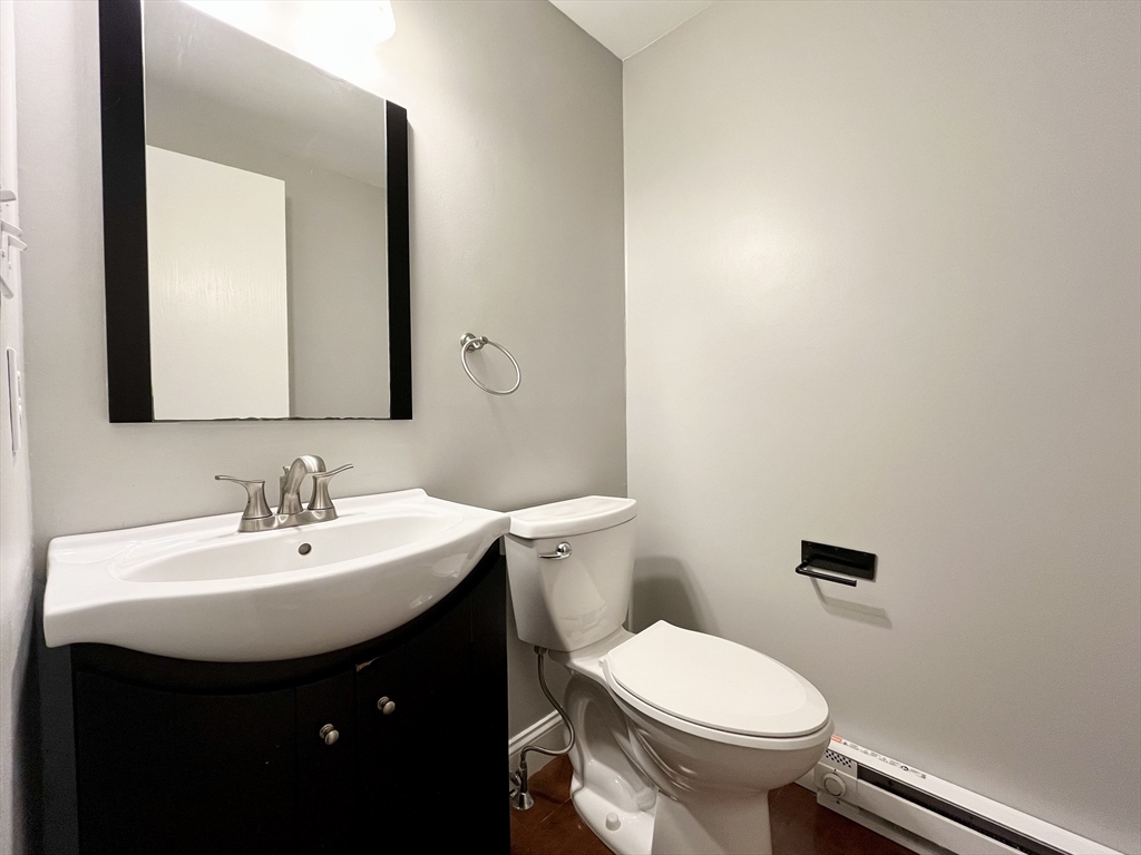 11 Jones Landing, Unit B Walpole, MA 02081 - Photo 8 of 18 a bathroom with a sink and a toilet