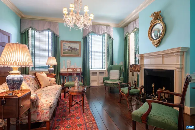 a bathroom with a toilet a sink and a mirror