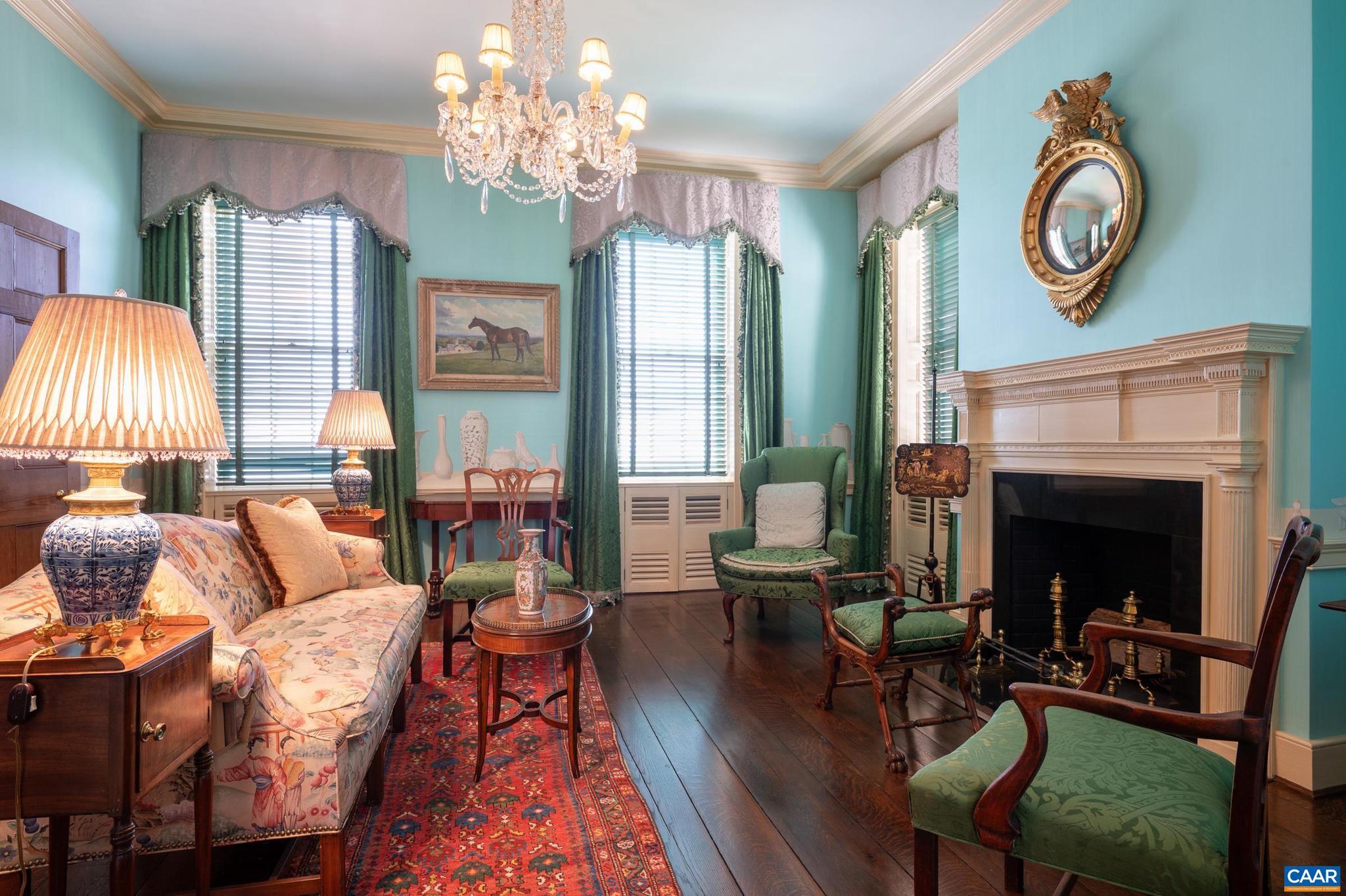 21515 Trappe Road Upperville, VA 20184 - Photo 15 of 75 a living room with furniture a chandelier and a fireplace