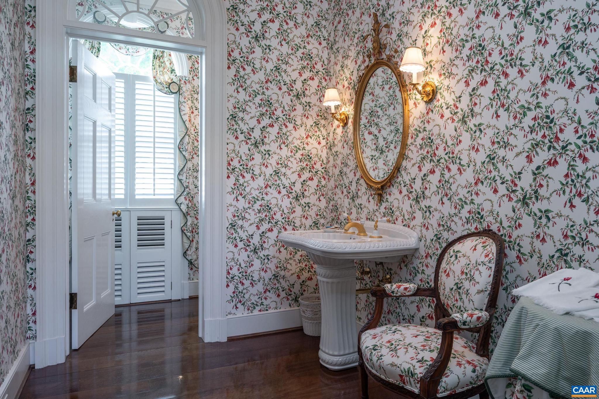 21515 Trappe Road Upperville, VA 20184 - Photo 23 of 75 a bathroom with a toilet a sink and a mirror