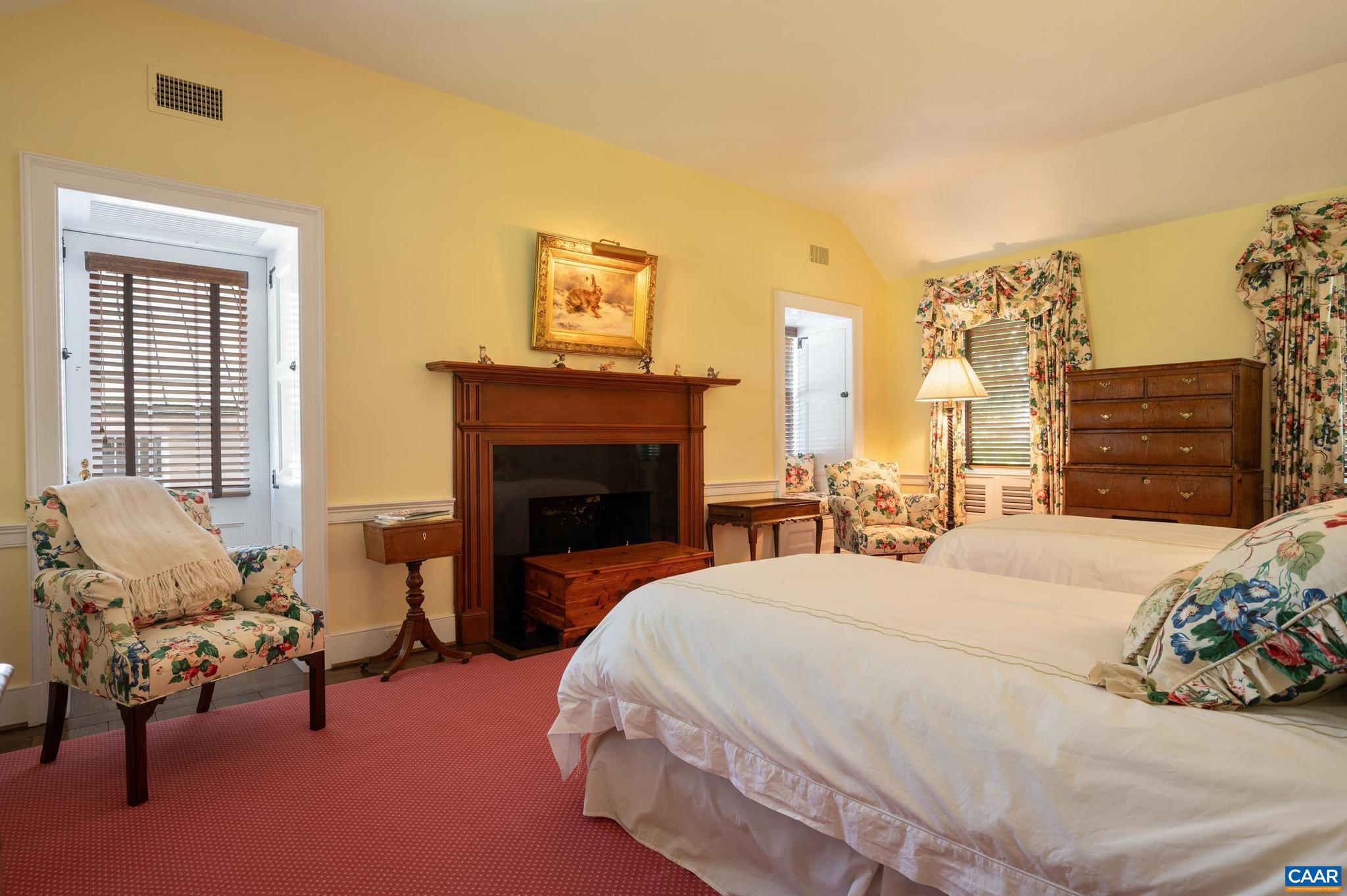 21515 Trappe Road Upperville, VA 20184 - Photo 28 of 75 a bedroom with a bed and a couch