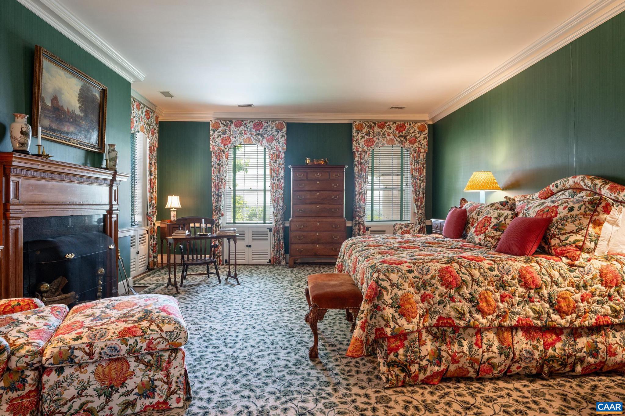 21515 Trappe Road Upperville, VA 20184 - Photo 29 of 75 a bedroom with a bed and a fireplace