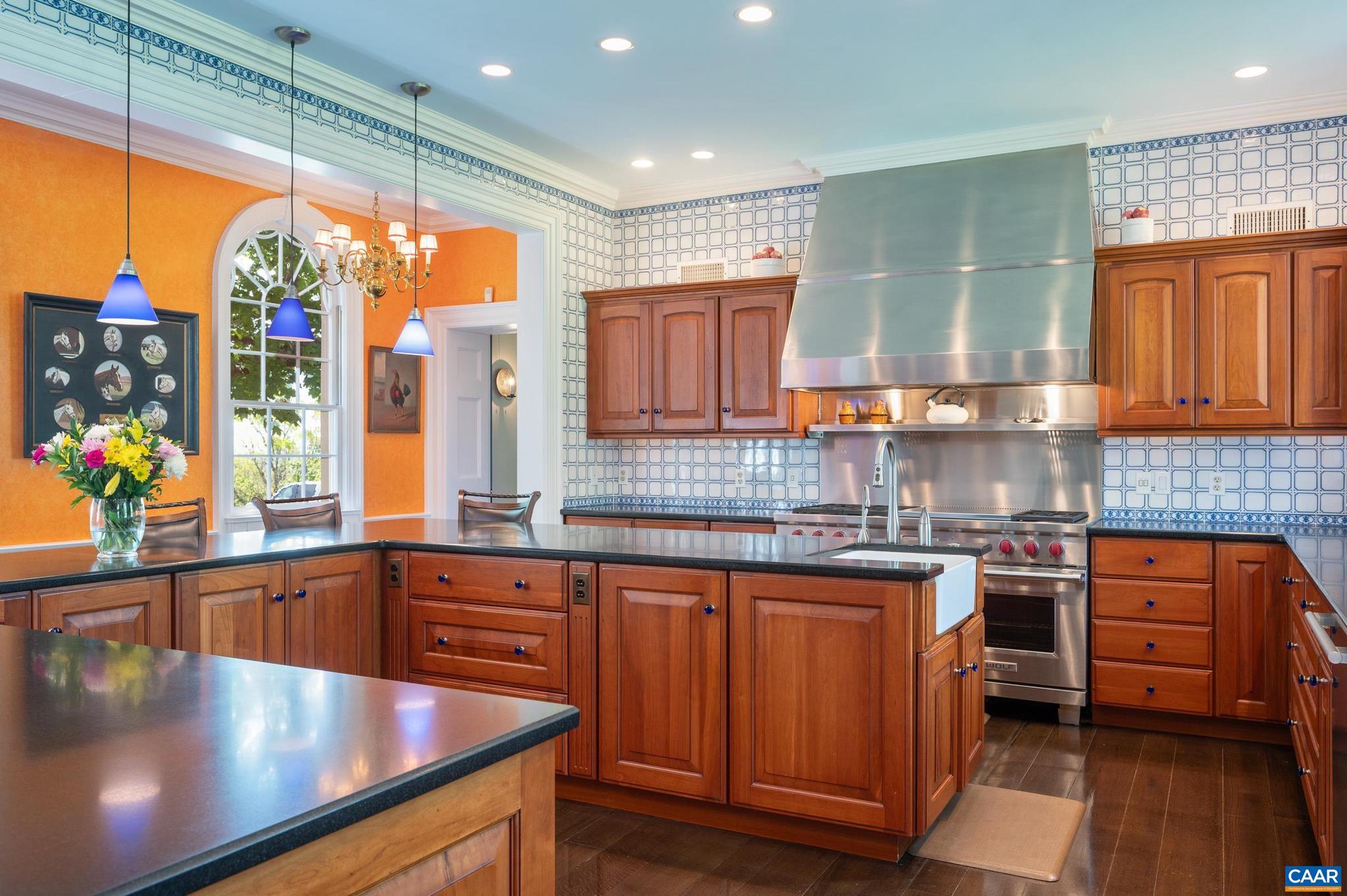 21515 Trappe Road Upperville, VA 20184 - Photo 35 of 75 a kitchen with lots of counter top space and wooden floor