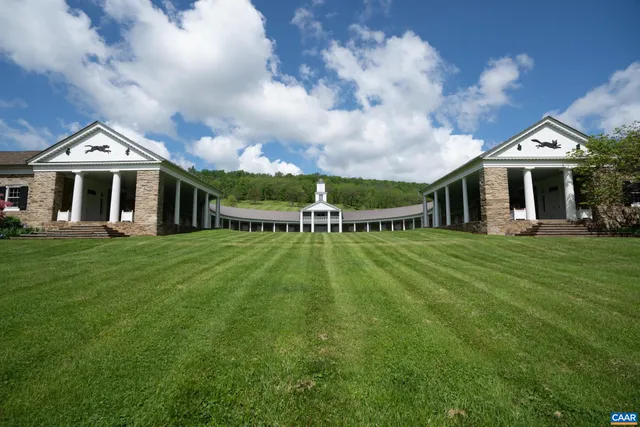 a view of a lake with a big yard