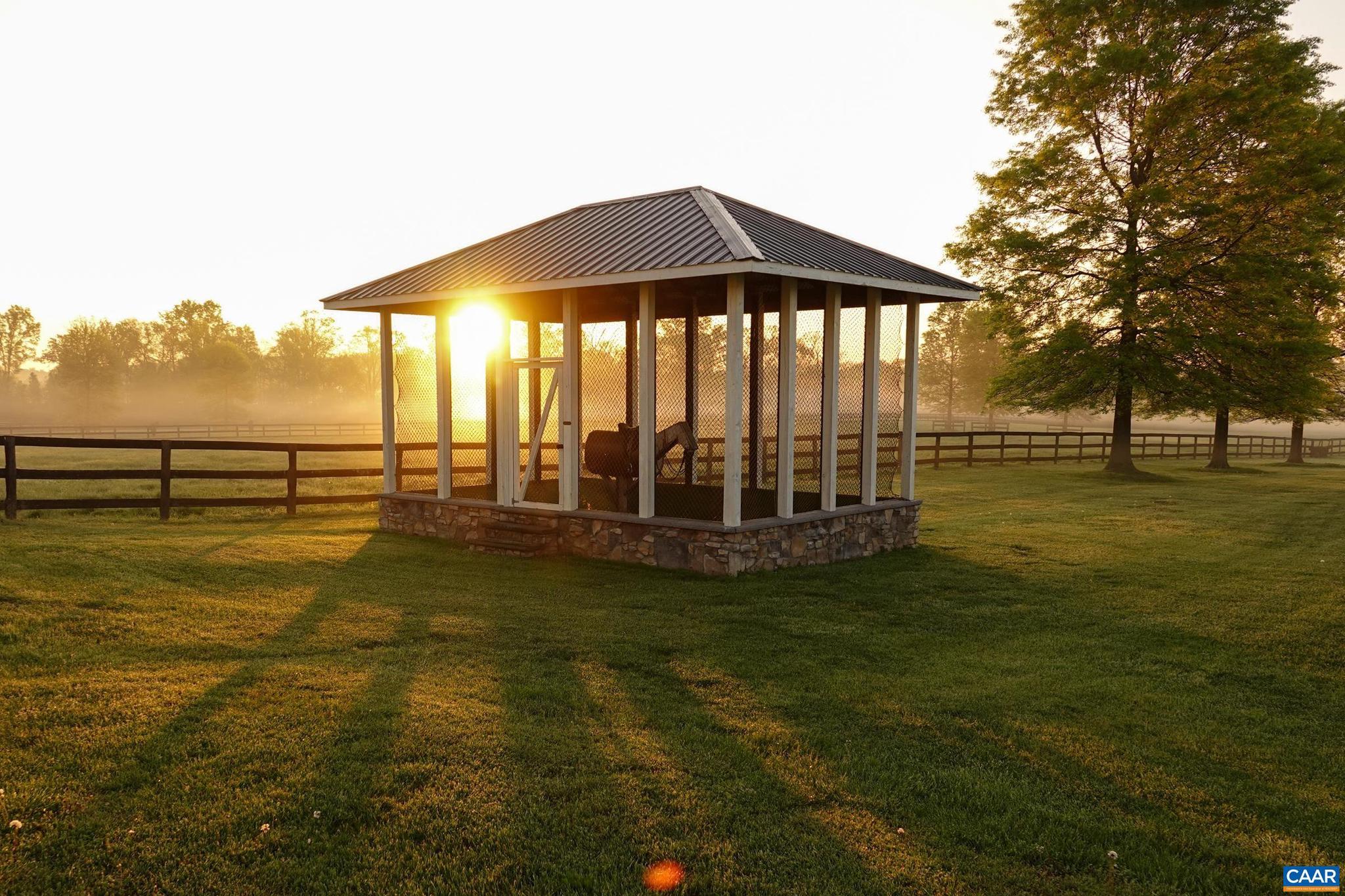 21515 Trappe Road Upperville, VA 20184 - Photo 50 of 75 a view of a swimming pool with an outdoor seating