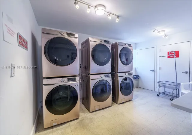 a utility room with dryer and washer