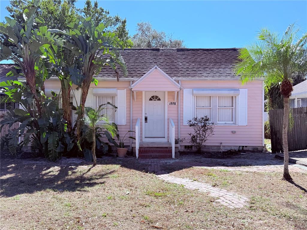1908 20th Avenue North St. Petersburg, FL 33713 - Photo 1 of 39 a front view of a house with a yard