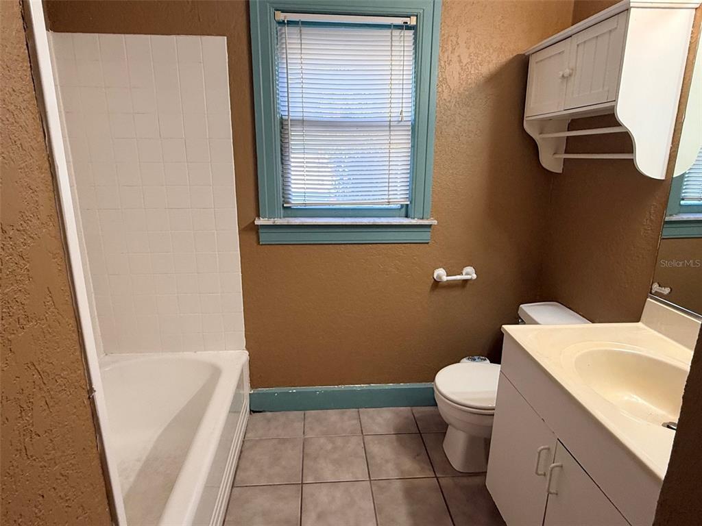 1908 20th Avenue North St. Petersburg, FL 33713 - Photo 18 of 39 a bathroom with a sink and a vanity