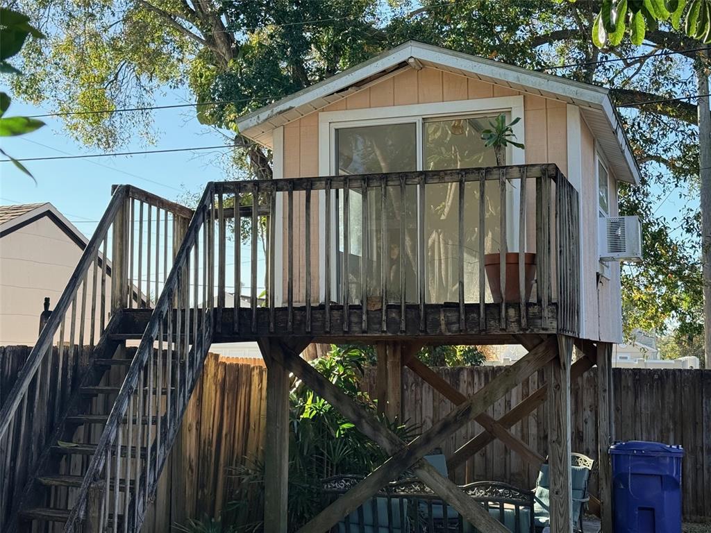 1908 20th Avenue North St. Petersburg, FL 33713 - Photo 34 of 39 a view of a wooden house with a small yard and wooden fence