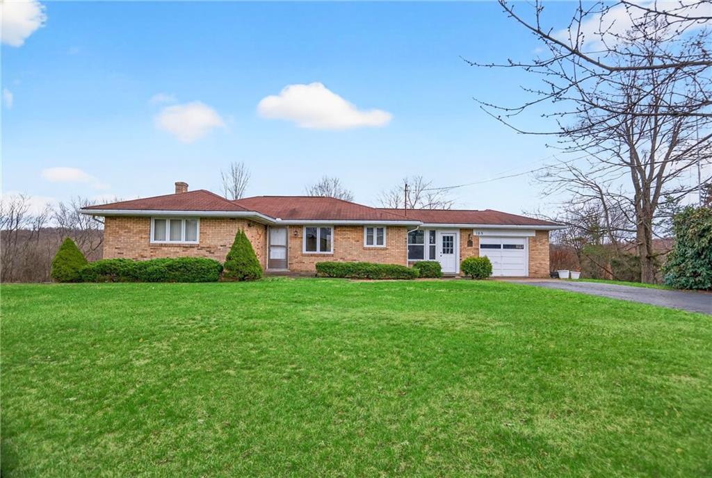 105 Clearview Drive Baden, PA 15005 - Photo 1 of 43 a front view of a house with a garden