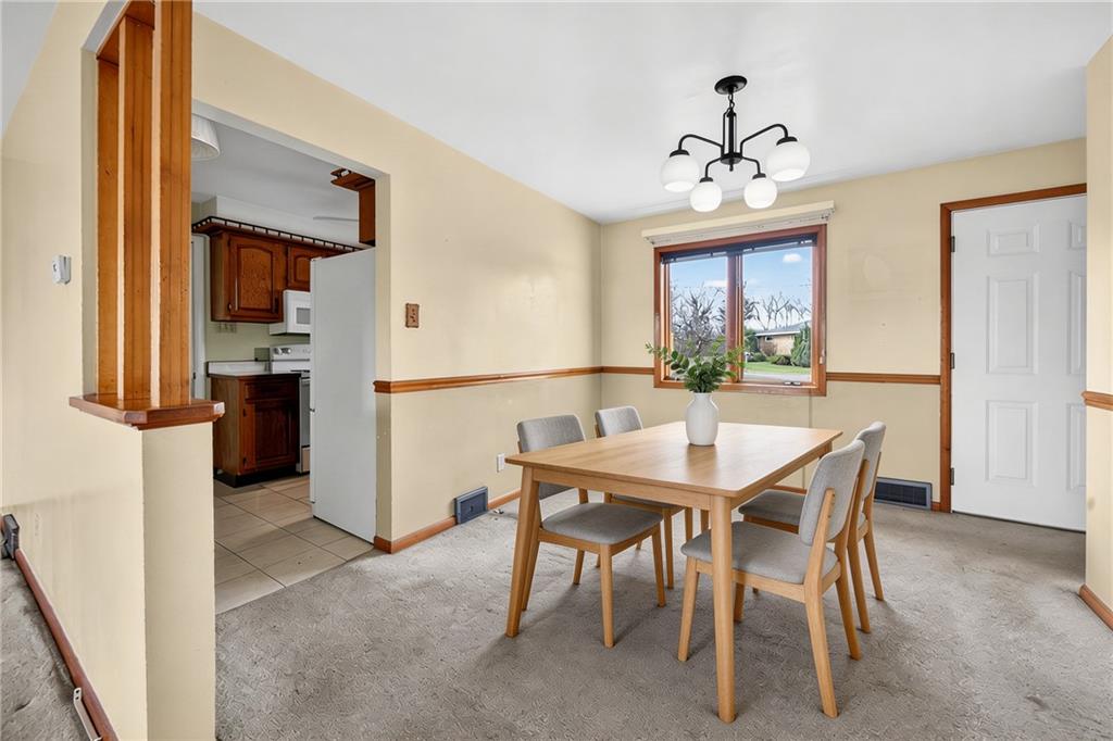 105 Clearview Drive Baden, PA 15005 - Photo 13 of 43 a view of a dining room with furniture and window