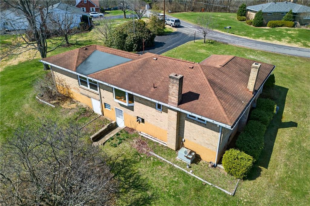 105 Clearview Drive Baden, PA 15005 - Photo 32 of 43 an aerial view of a house with pool outdoor seating and yard