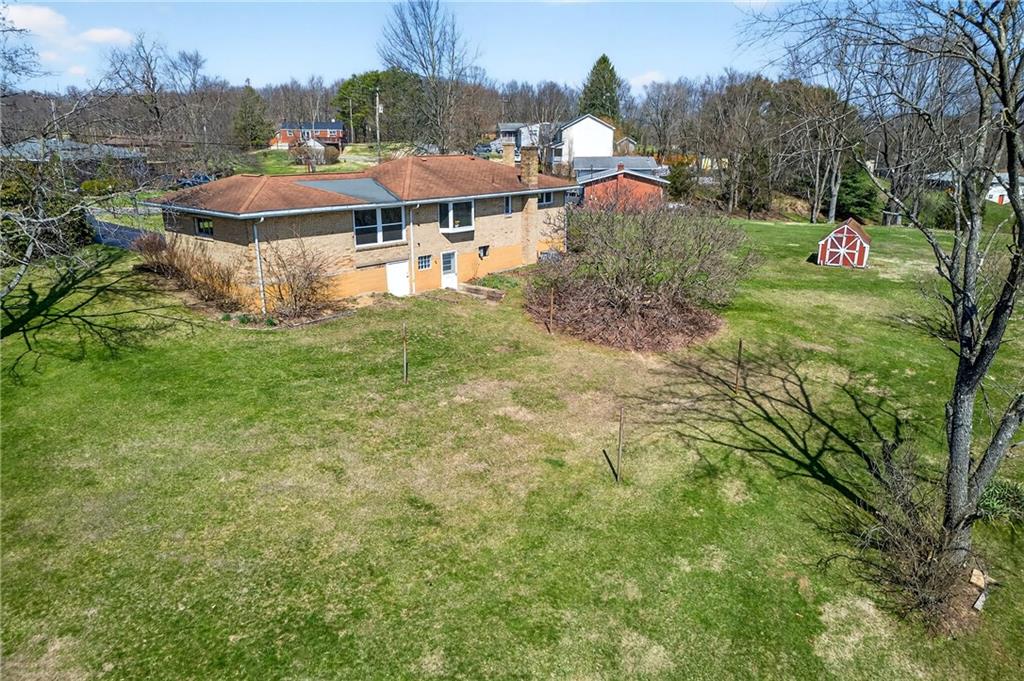 105 Clearview Drive Baden, PA 15005 - Photo 34 of 43 a view of a house with pool and a yard