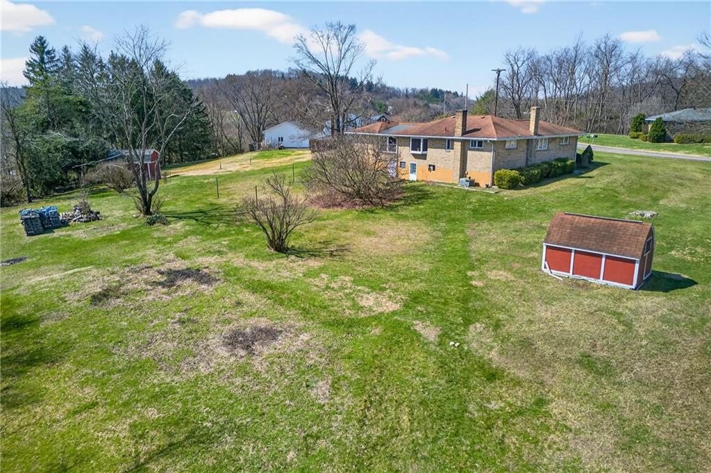 105 Clearview Drive Baden, PA 15005 - Photo 35 of 43 an aerial view of residential houses with outdoor space and trees