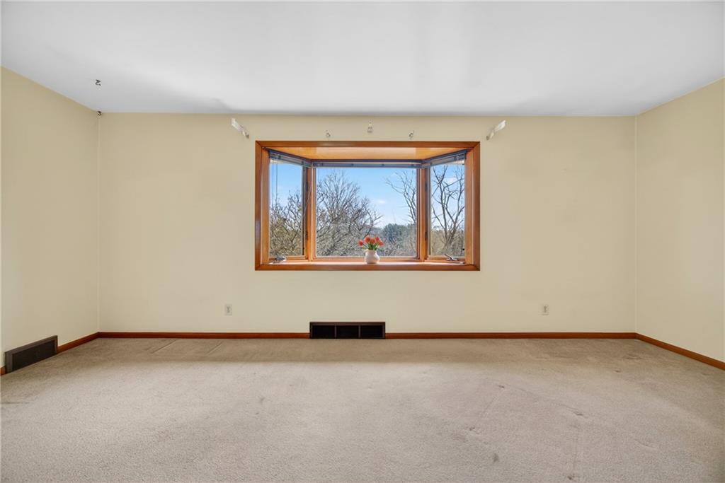 105 Clearview Drive Baden, PA 15005 - Photo 8 of 43 an empty room with a workbench