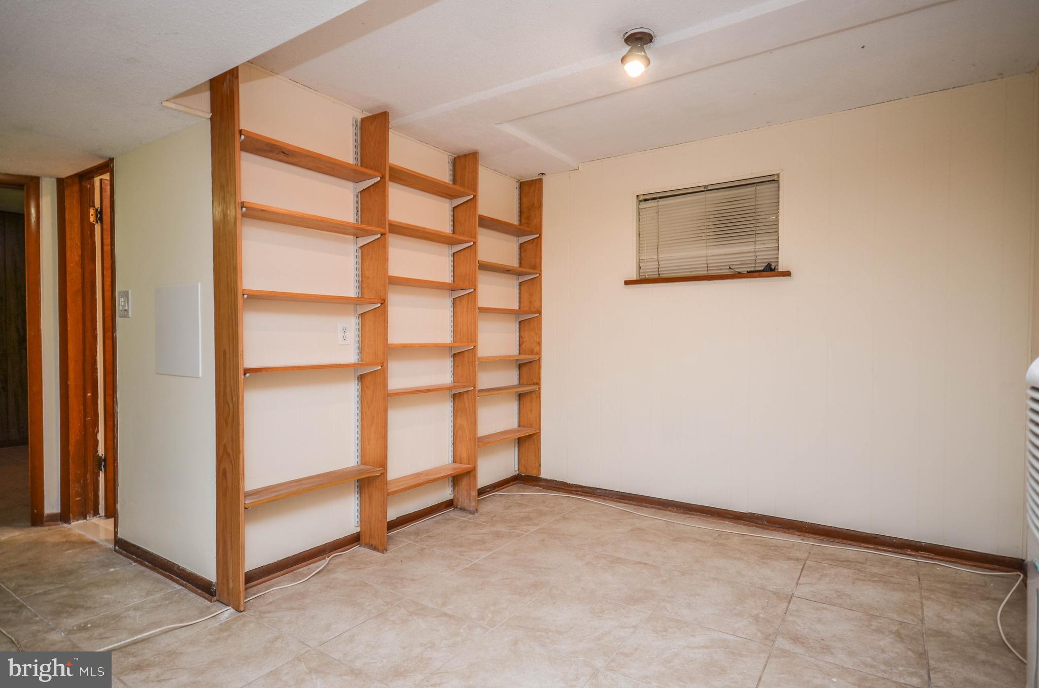 2034 Glen Ross Road Silver Spring, MD 20910 - Photo 24 of 40 a view of an empty room with a cabinet