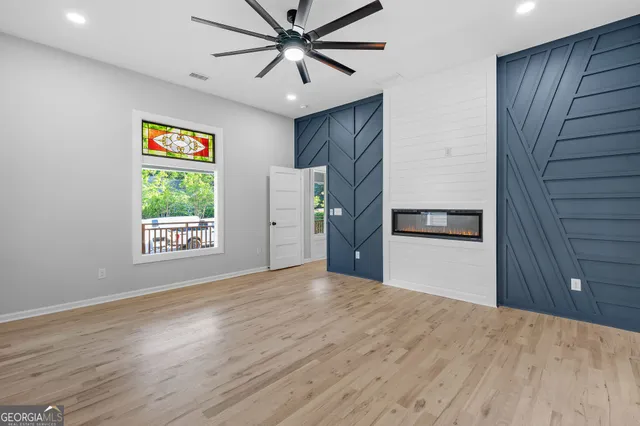 a view of an empty room with a window