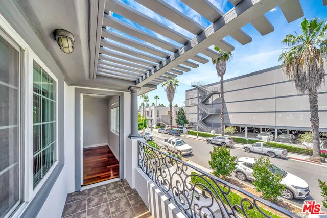 a view of a porch with seating space